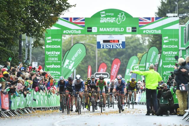 Tour Of Britain Cyclists stream through the finish line in Mansfield in 2018.