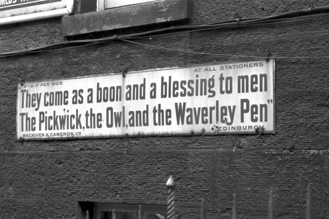 One of the enamelled advertisements on the frontage of Blair Street in Edinburgh promoting MacNiven & Cameron's  Pickwick, Owl and Waverley fountain pens. Picture taken in April 1982. 