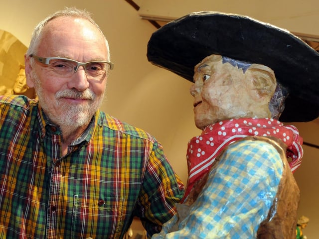Sculpter Philip Cox with one of his models exhibited at the Mansfield Museum.