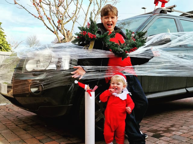 Bubbles the Elf doing a spot of Christmas wrapping