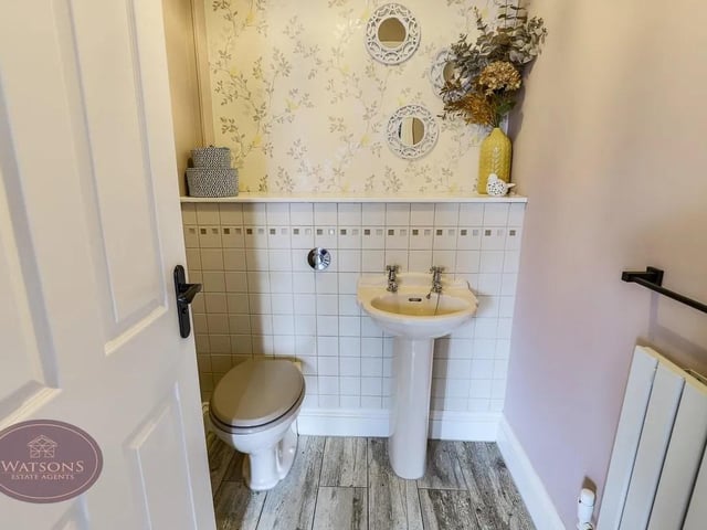 The downstairs WC adds a touch of convenience.