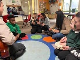 Musician in Residence Erika Zeckser Owen (third right) working with pupils at Oak Tree Primary School in  Mansfield.