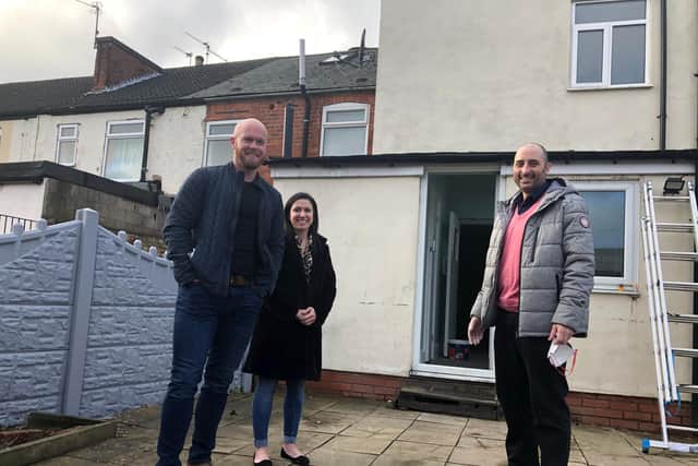 Richard and Gemma Purseglove pictured with property owner Paul Malone in Shirebrook.
