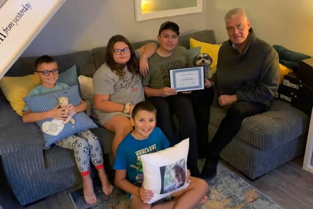 Jak Marshall, aged 14 , from Carsic who has been awarded Ahsfield 'Resident of the Month'  - he is pictured with his award, with his siblings Lillie, aged 13, and twin brother 11-year-old Oliver and Oscar, meeting Lee Anderson MP for Ashfield and Eastwood,