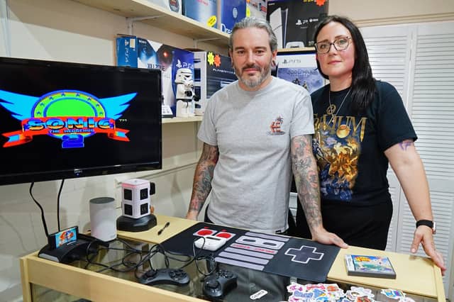 Your first look at the new retro gaming shop, Retrovault, on High Street, Warsop. Pictured: Adam Buckle and Jen Straw.