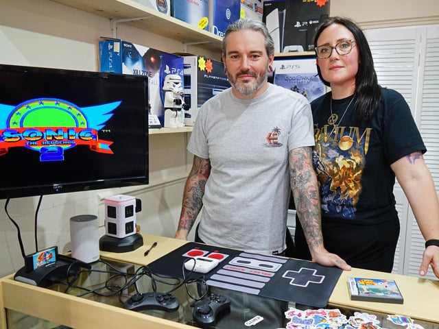 Your first look at the new retro gaming shop, Retrovault, on High Street, Warsop. Pictured: Adam Buckle and Jen Straw.