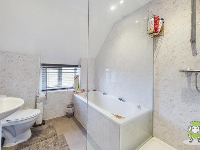 Choose between the bath or shower in this sizeable bathroom on the first floor. There's a wash basin and WC too.