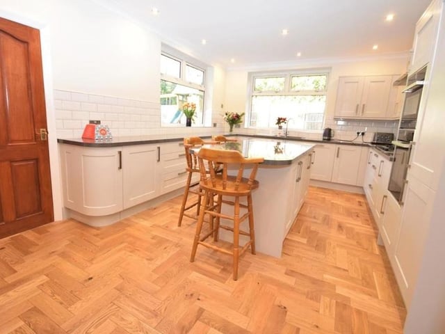 The stylish and contemporary breakfast kitchen is newly fitted, with numerous wall and base units on all sides of the room, plenty of worktop space and a one-and-a-half-bowl sink and drainer.