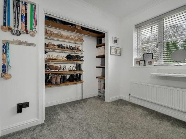 This is the second bedroom that has been turned into a dressing room by the vendors. It has internally built wardrobes.