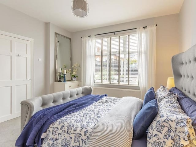 A second shot of the first bedroom, which has plenty of space and flexibility.