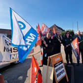 A picket line during the latest strike by ambulance staff.