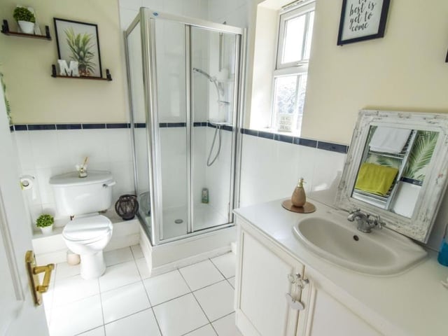 Here is the en suite bathroom to the first bedroom. Compact and cute.