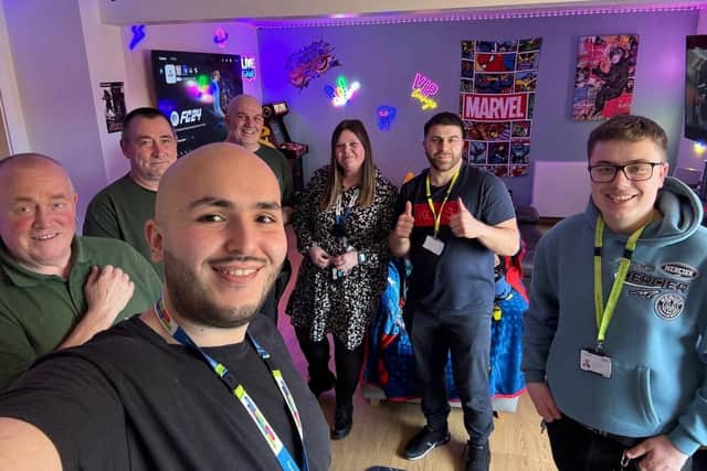 Raf (front) with staff from Cygnet Manor in their new Social Hub