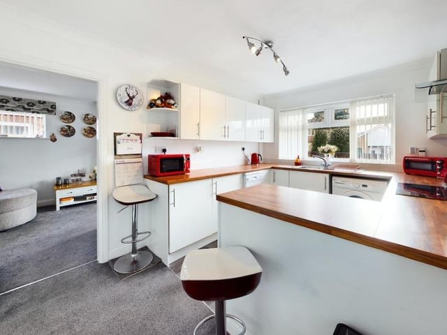 Take a seat while you enjoy a cuppa or even a bit of breakfast in the well laid-out kitchen. It opens seamlessly into the living room.