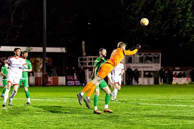 The Wood's goalkeeper Jordan Pierrepont in action at Lincoln United. Photo: Steve W Davies Photography.