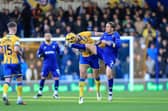 Action during the Sky Bet League 2 match against AFC Wimbledon at Cherry Red Records Stadium, 13 December 2025 Photo Chris Holloway / The Bigger Picture.media