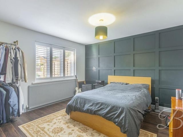 Back to the ground floor now to take a look at the other two bedrooms. This one features decorative panelling.