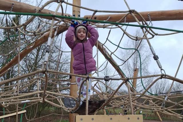 Local resident, Isabelle, testing out the new equipment