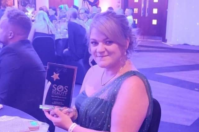 Amy Elliott with her award.