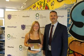 Maddy Smith, with head teacher David Broomhead, achieved five grade 9s. Photo: Submitted