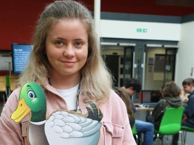 Karolina Walos with the egg in the nest game