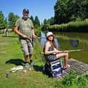 Sherwood Forest Fishery has been hosting fishing events for children throughout the school holidays. Laila, aged 11, with her dad, Matthew King.