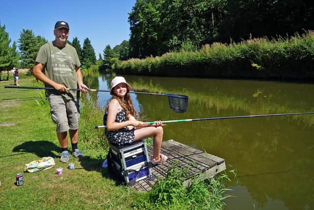 Sherwood Forest Fishery has been hosting fishing events for children throughout the school holidays. Laila, aged 11, with her dad, Matthew King.