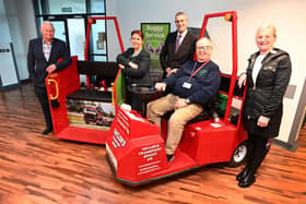 Alan Taylor, managing director, (far left) and his wife Kay (far right) with Claire Ward, chair of Sherwood Forest Hospitals, and Paul Horton, marketing manager at B Taylor & Sons Transport Ltd. Pictured sitting in the buggy is volunteer Malc Coupe.