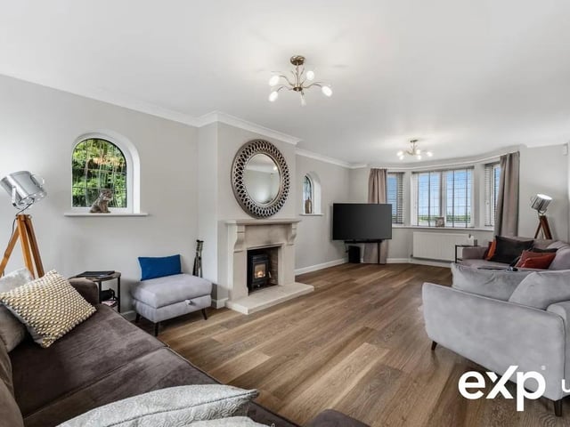 Spanning the full depth of the house, a big, bright, comfortable lounge is enhanced by a superb dual-aspect design that is created by a beautiful walk-in bay window to the front, having far-reaching views across open fields, and a window to the rear overlooking the landscaped garden. Two arched feature windows introduce further natural light.