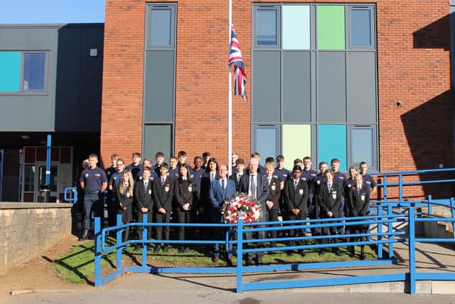 A wreath was laid by John Maher, headteacher, Wesley Davies, CEO of The Two Counties Trust as well as a collection of staff and students.