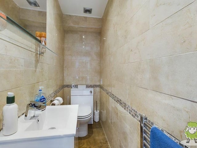 Completing our tour of the ground-floor rooms is the toilet or cloakroom, complete with low-level WC and wash hand basin.