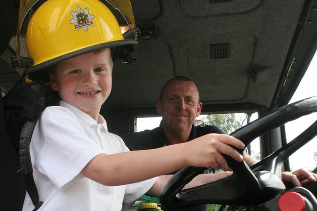 2008: Crew manager Paul Bradley, and Alfie Hawksworth, 4, are pictured at a Kimberley Primary and Nursery School firefighter visit.