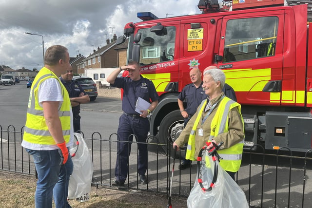 Firefighters chat to some litter-pickers during the day of action.