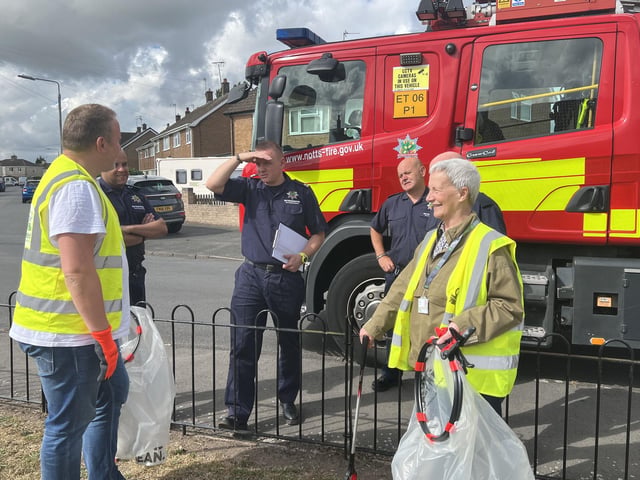 Firefighters chat to some litter-pickers during the day of action.