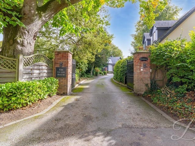 Let's drift outside now, and this is the view you get as you approach the electric gates to the property and its long, winding driveway.