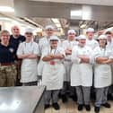 Student chefs with the guests from the 167 Catering Support Regiment.
