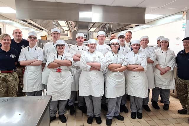 Student chefs with the guests from the 167 Catering Support Regiment.