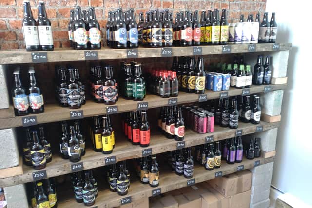There are more than 80 different bottles and cans on offer inside the new shop.