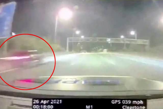 The moment Usman Kiani’s black Audi S3 flies past police