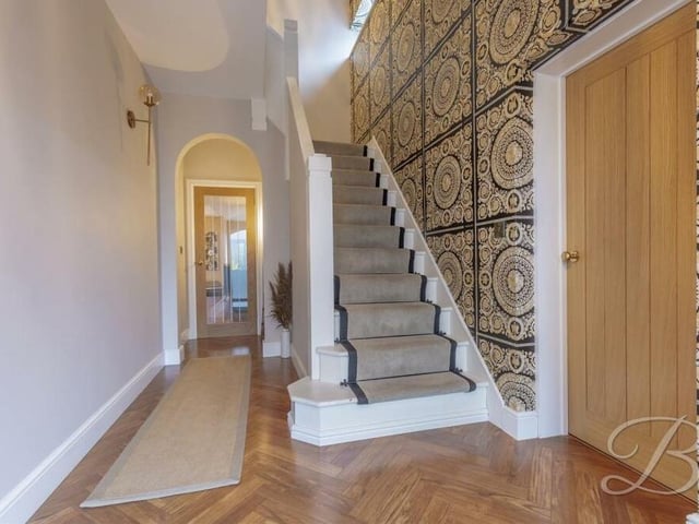 As we prepare to go upstairs, let's pass through the entrance hall which, in keeping with the rest of the £495,000 house, is beautifully presented.
