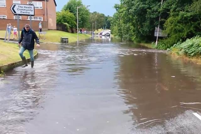 Flooding on Oak Tree Lane in Mansfield.