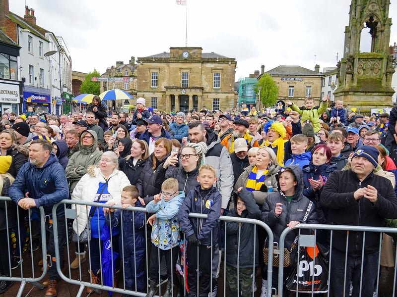 Crowds packed into Mansfield town centre this afternoon to salute their heroes.