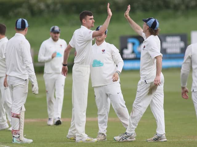 Joe Worrall celebrates an early wicket for Cuckney against Plumtree.