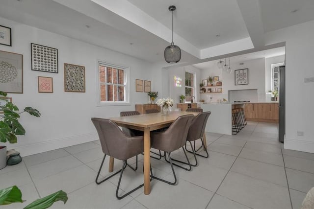 The kitchen opens out on to this pleasant dining area. As you can see, there is plenty of space for tables and chairs. Nearby is a utility room with space for a washing machine and tumble dryer.