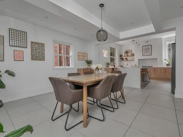 The kitchen opens out on to this pleasant dining area. As you can see, there is plenty of space for tables and chairs. Nearby is a utility room with space for a washing machine and tumble dryer.