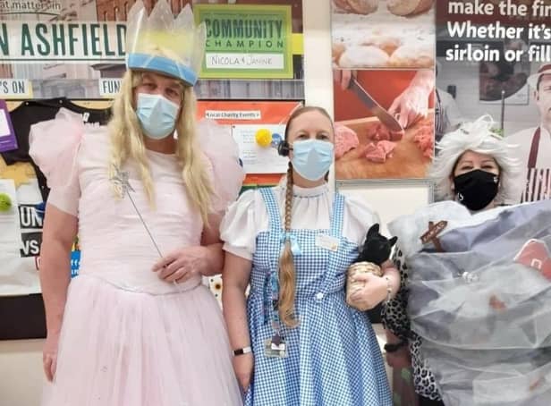 Staff from Kirkby Morrisons dressed as characters from the Wizard of Oz