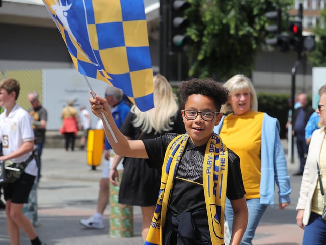 Mansfield Town fans soak up the Wembley atmosphere.