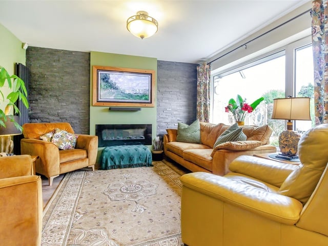 The main reception room at the £380,000-plus property is the tasteful lounge/diner. Its features include a full-height slate wall, Moduleo country oak flooring and lovely views of the back garden