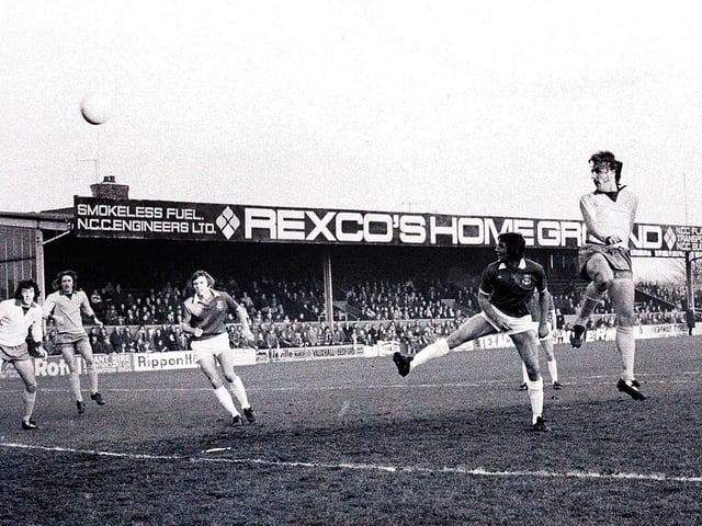 Terry Eccles wins a header during a game against Wrexham in 1975.