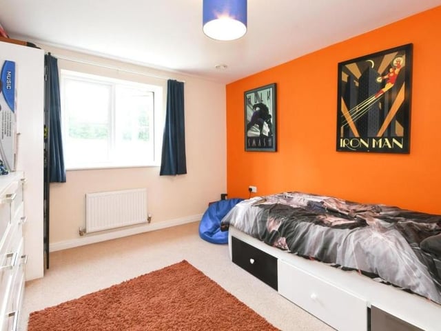 Here is the third bedroom at the back of the property. Fit for a with-it teenager, maybe?